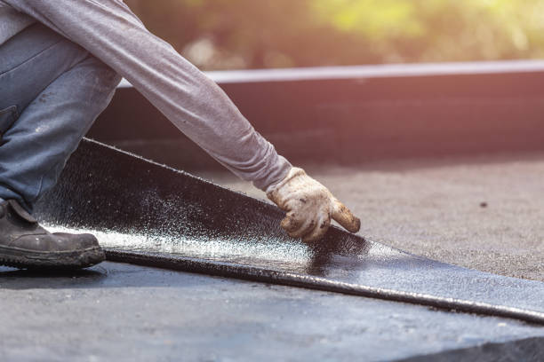 Professional Basement Waterproofing technician working in Webster, IN